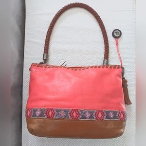 The sak leather handbag, with beating. 12" long 7 1/2" high